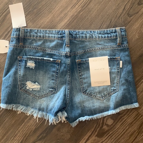 New High Rise Jean frayed shorts with holes. Med. - Picture 3 of 3